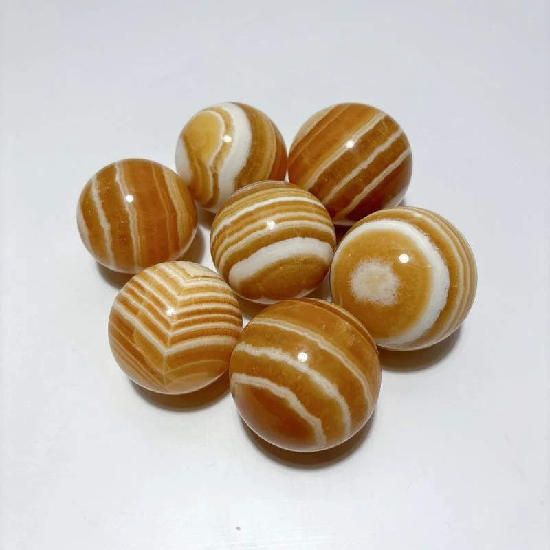 1.9-2.5inch Yellow Calcite Stripe Spheres Wholesale - Image 2