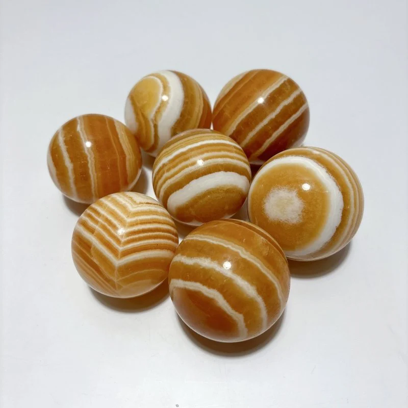 1.9-2.5inch Yellow Calcite Stripe Spheres Wholesale - Image 3