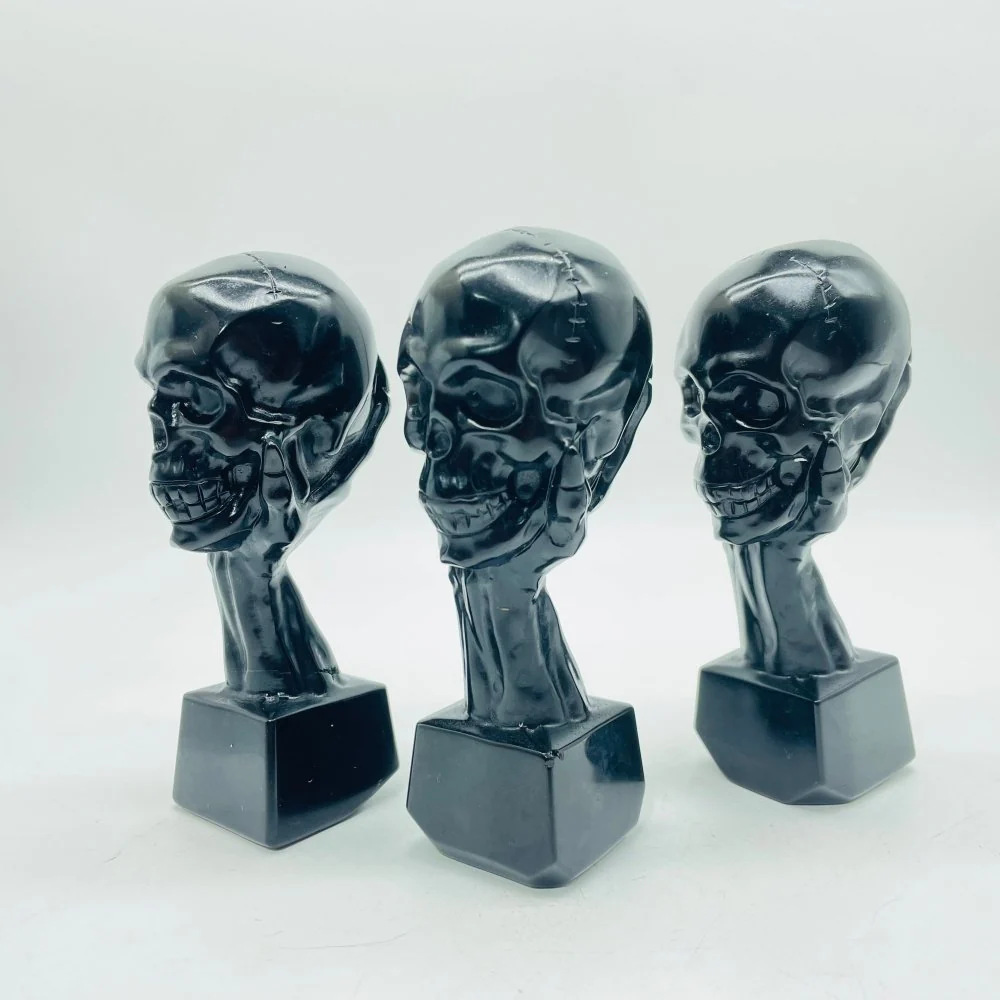 Black Obsidian Hand Holding Skull Carving Wholesale - Image 3