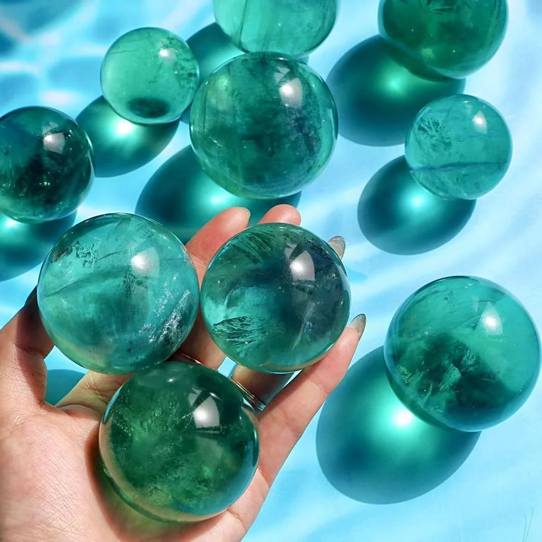 green fluorite crystal spheres with rainbow - Image 3