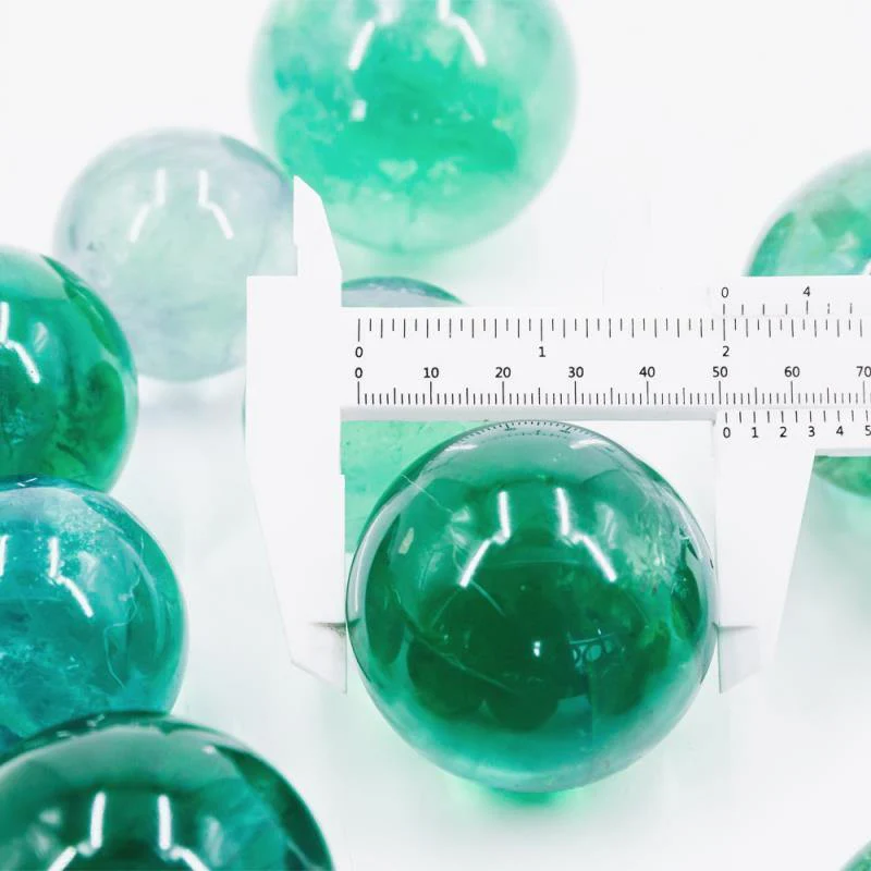 green fluorite crystal spheres with rainbow - Image 4
