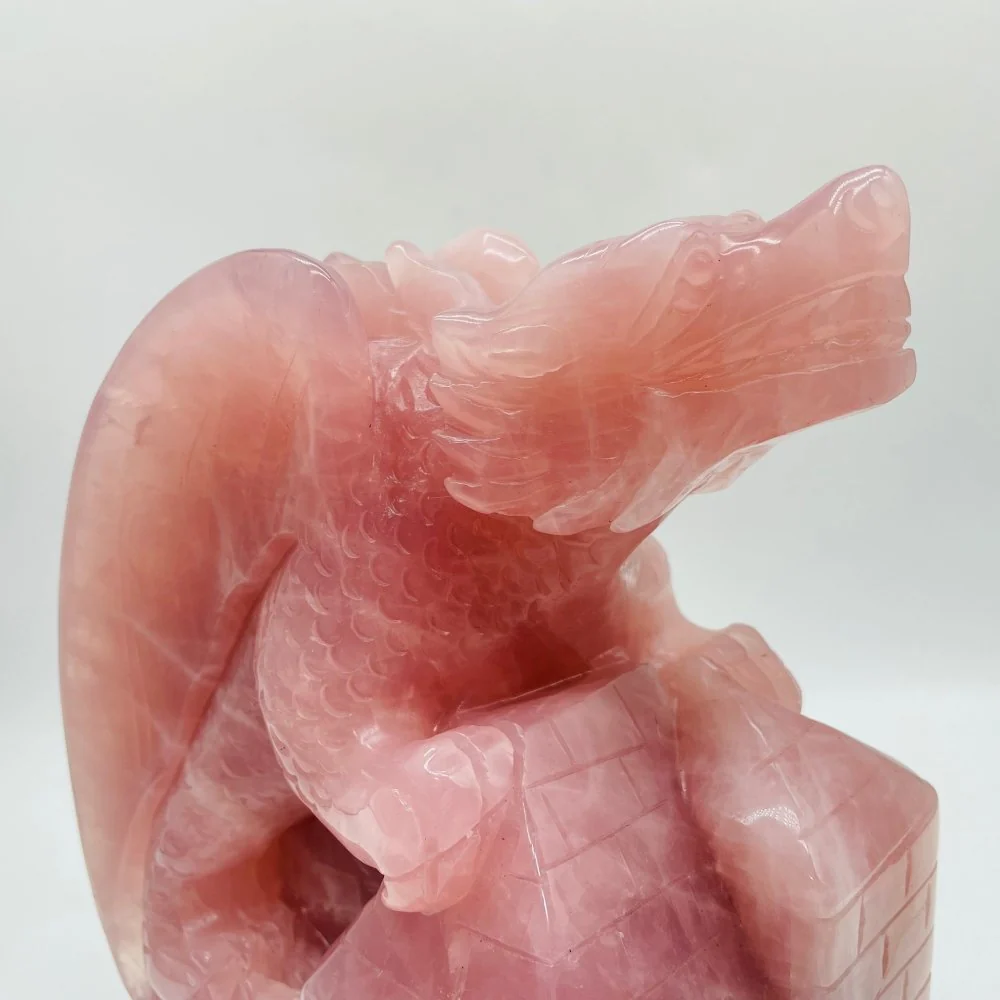 Large Unique Madagascar Rose Quartz Dragon With Castle Carving - Image 2