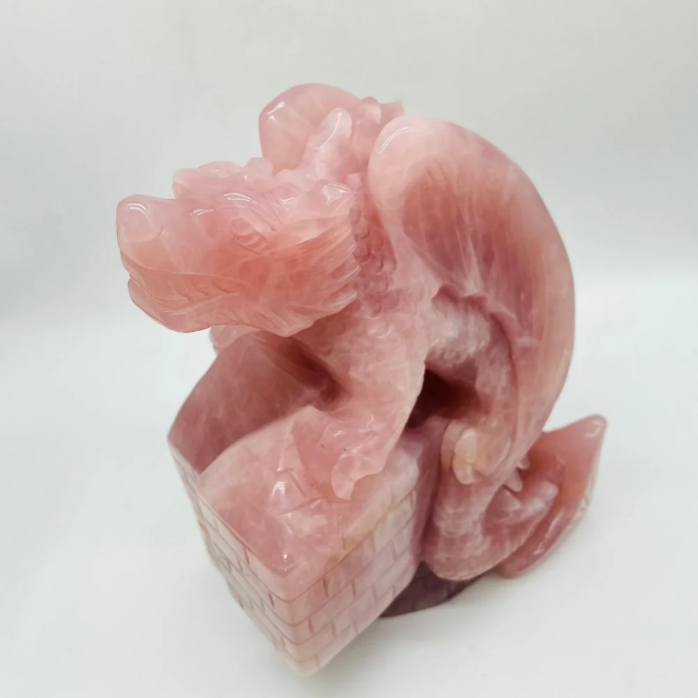 Large Unique Madagascar Rose Quartz Dragon With Castle Carving - Image 4