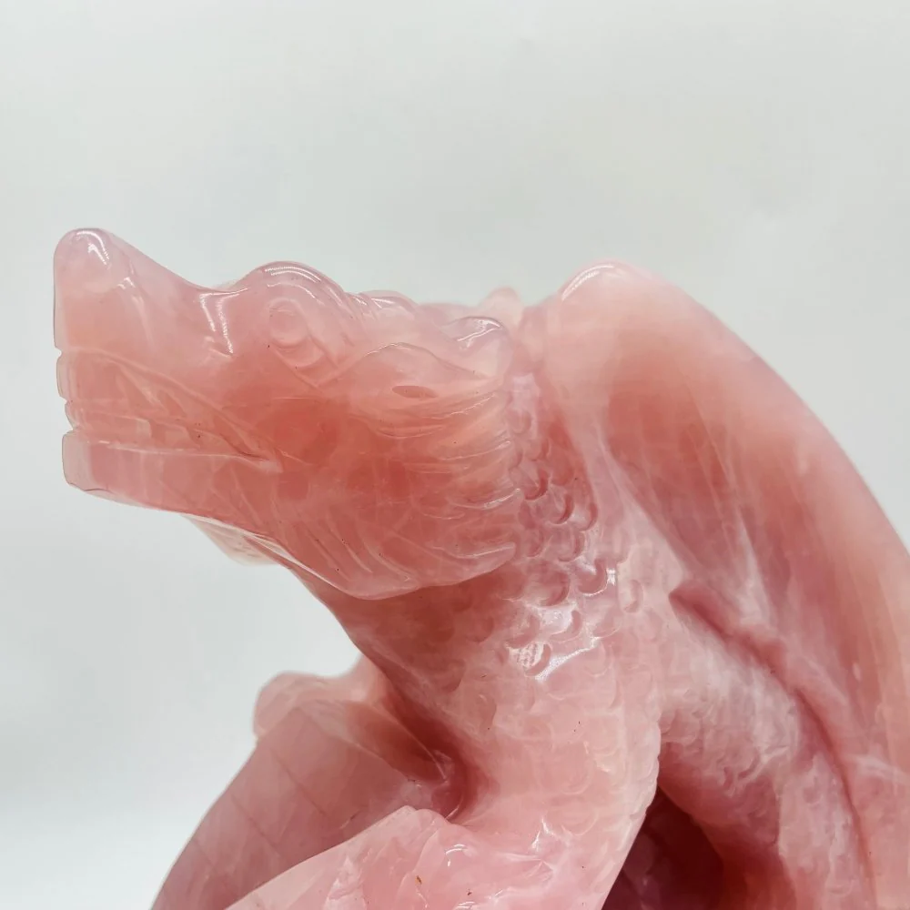 Large Unique Madagascar Rose Quartz Dragon With Castle Carving - Image 5
