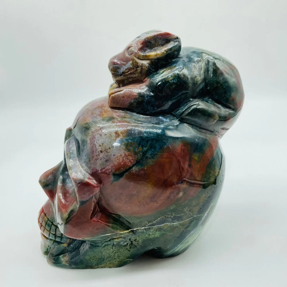 Unique Ocean Jasper Skull With Rabbit Carving - Image 2