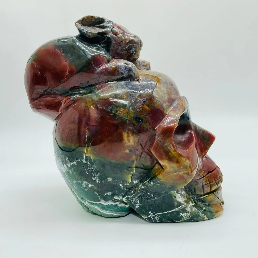 Unique Ocean Jasper Skull With Rabbit Carving - Image 5