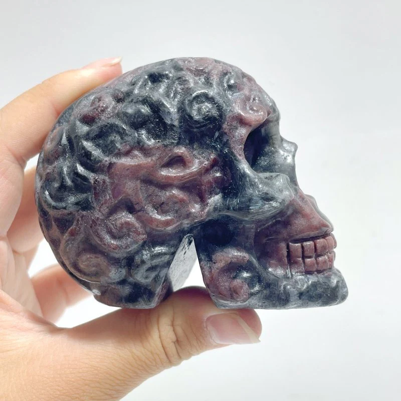 Local Stock - Garnet Mixed Astrophyllite Skull Carving Wholesale - Image 2