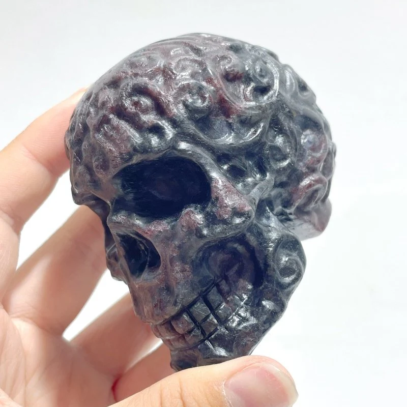 Local Stock - Garnet Mixed Astrophyllite Skull Carving Wholesale - Image 3